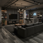 Modern living room with dark furniture and decor, including a sofa, coffee table, and bookshelves.